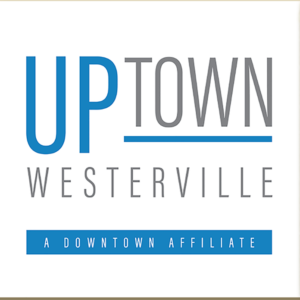 district plaque about uptown volunteer